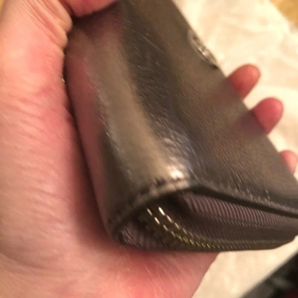 Michael kors silver metallic clutch zipper wall wristlet